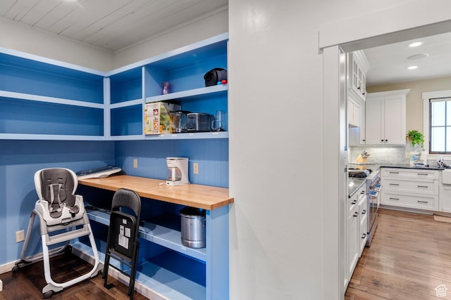 300 S 100th St W, Garden City, UT 84028 - office featuring built in desk, wood finished floors, and recessed lighting