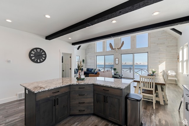 689 N Cambry Dr, Garden City, UT 84028 - kitchen with a water view, dark wood-type flooring, baseboards, light stone countertops, and recessed lighting