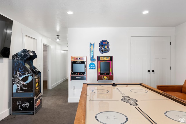 689 N Cambry Dr, Garden City, UT 84028 - game room with dark colored carpet, baseboards, and recessed lighting