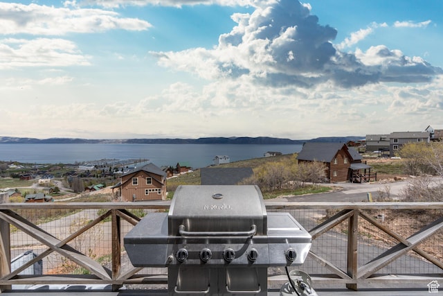 689 N Cambry Dr, Garden City, UT 84028 - wooden terrace featuring a water view and grilling area