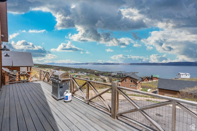 689 N Cambry Dr, Garden City, UT 84028 - wooden terrace featuring a water view and grilling area