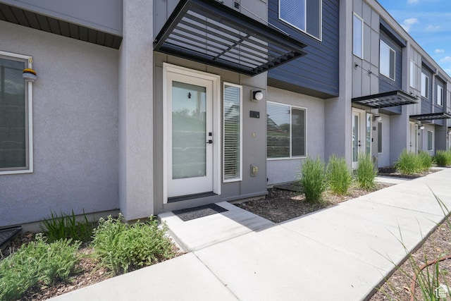 620 N Orchard Dr Unit 11, North Salt Lake, UT 84010 - view of exterior entry with stucco siding