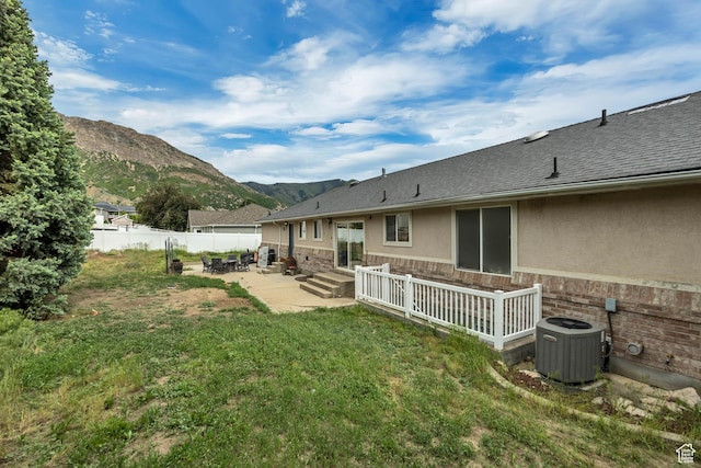 804 E 3300 N, North Ogden, UT 84414 - view of yard with central AC, a patio, a mountain view, and entry steps