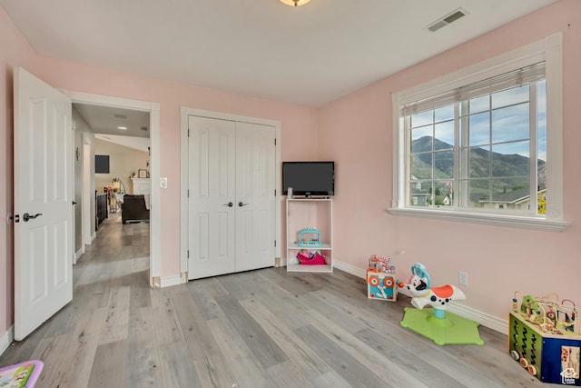 804 E 3300 N, North Ogden, UT 84414 - recreation room featuring baseboards and light wood-style floors