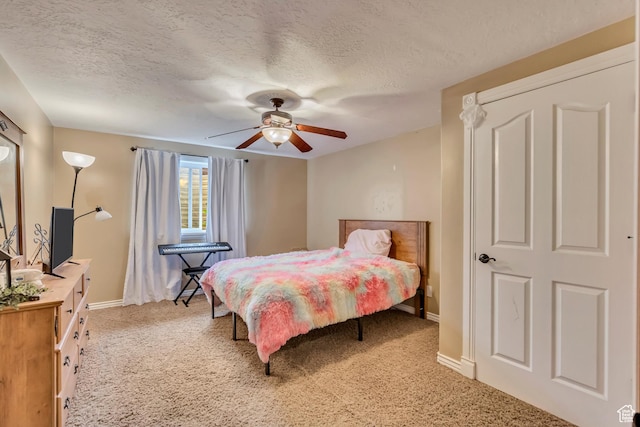 804 E 3300 N, North Ogden, UT 84414 - bedroom featuring light carpet, baseboards, a textured ceiling, and ceiling fan