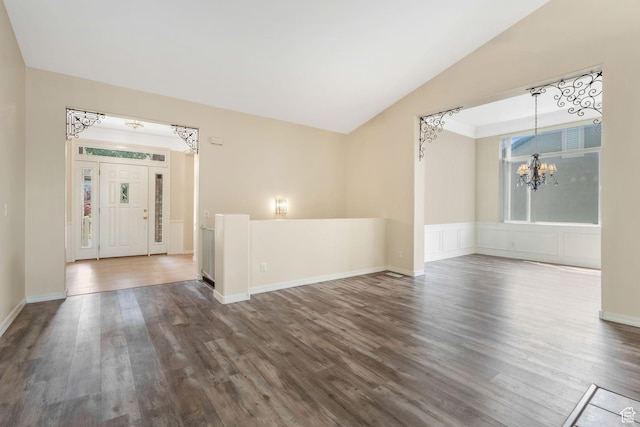 1267 E Hickenlooper Way S, Draper, UT 84020 - foyer entrance with a chandelier, dark wood finished floors, vaulted ceiling, and baseboards