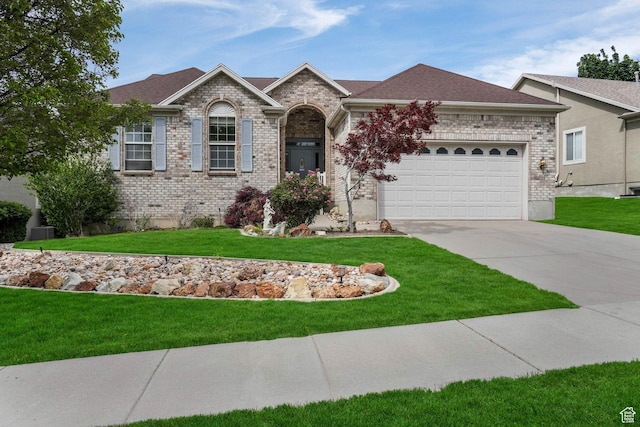 1267 E Hickenlooper Way S, Draper, UT 84020 - single story home featuring concrete driveway, a garage, a front lawn, and brick siding