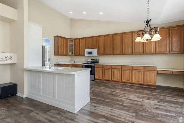 1267 E Hickenlooper Way S, Draper, UT 84020 - kitchen featuring stainless steel electric stove, white microwave, brown cabinets, light countertops, and high vaulted ceiling