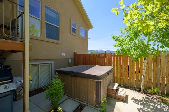 14745 N 8375 E, Spring City, UT 84662 - view of patio / terrace featuring a hot tub, a mountain view, and grilling area