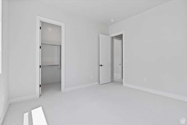 5854 N Fox Canyon Rd, Lehi, UT 84043 - unfurnished bedroom with carpet, baseboards, a spacious closet, and a closet