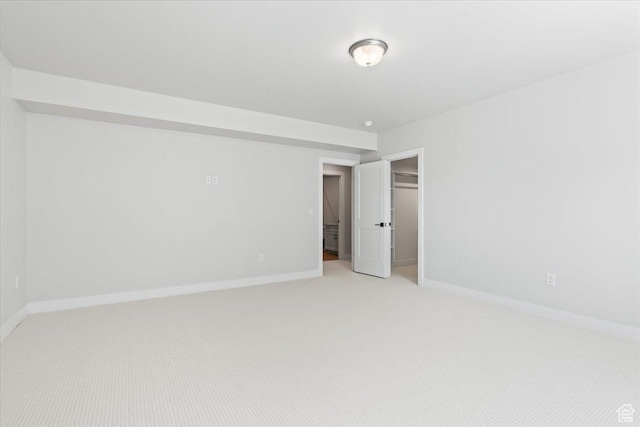 5854 N Fox Canyon Rd, Lehi, UT 84043 - unfurnished bedroom featuring light colored carpet, baseboards, and a closet
