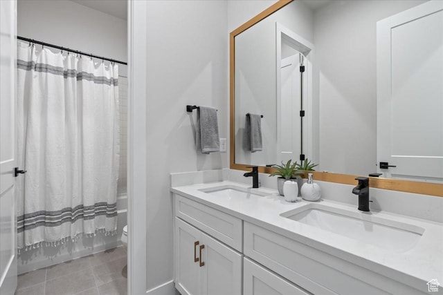 5854 N Fox Canyon Rd, Lehi, UT 84043 - bathroom featuring toilet, double vanity, shower / bath combo with shower curtain, and tile patterned flooring