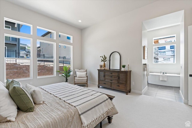 5854 N Fox Canyon Rd, Lehi, UT 84043 - carpeted bedroom with multiple windows, baseboards, recessed lighting, tile patterned flooring, and connected bathroom