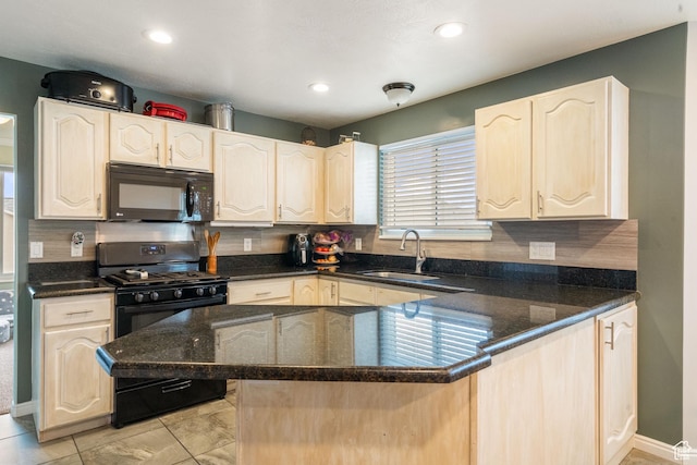5029 W Copper Meadow Ln S, West Jordan, UT 84088 - kitchen featuring black appliances, a sink, a peninsula, backsplash, and dark stone countertops