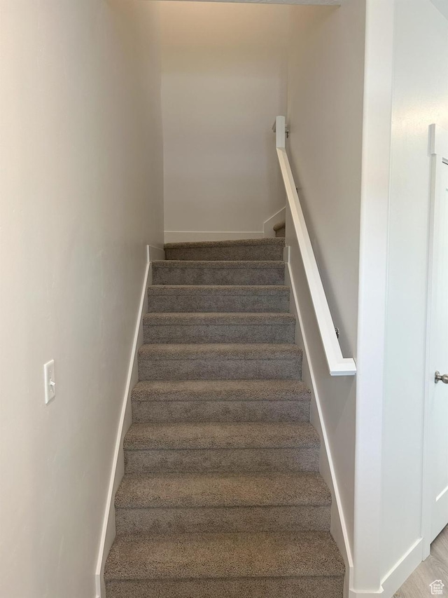 5118 E Lakefield Dr N, Eagle Mountain, UT 84005 - stairs featuring baseboards