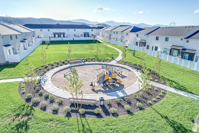 5118 E Lakefield Dr N, Eagle Mountain, UT 84005 - aerial perspective of suburban area featuring a mountainous background and a recreational park