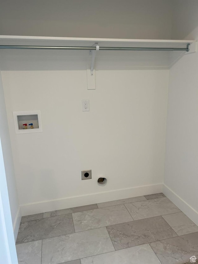 5118 E Lakefield Dr N, Eagle Mountain, UT 84005 - laundry room with light marble finish floors, hookup for a washing machine, baseboards, and hookup for an electric dryer