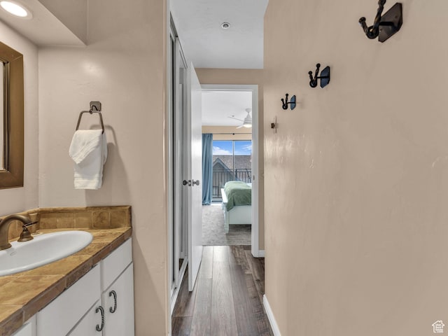 1401 Lowell Ave Unit 31, Park City, UT 84060 - bathroom with vanity, wood finished floors, ensuite bath, and baseboards