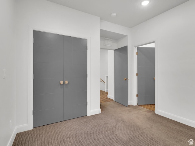 1618 E 3300 S, Millcreek, UT 84106 - unfurnished bedroom featuring carpet floors, a closet, and baseboards