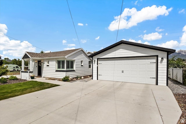 6571 S Jefferson St, Murray, UT 84107 - ranch-style house featuring a detached garage