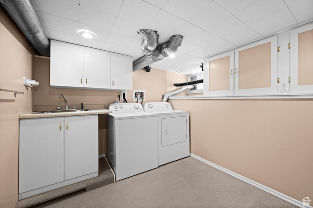 1636 S 1400 E, Salt Lake City, UT 84105 - laundry room featuring cabinet space, washing machine and dryer, light colored carpet, and baseboards