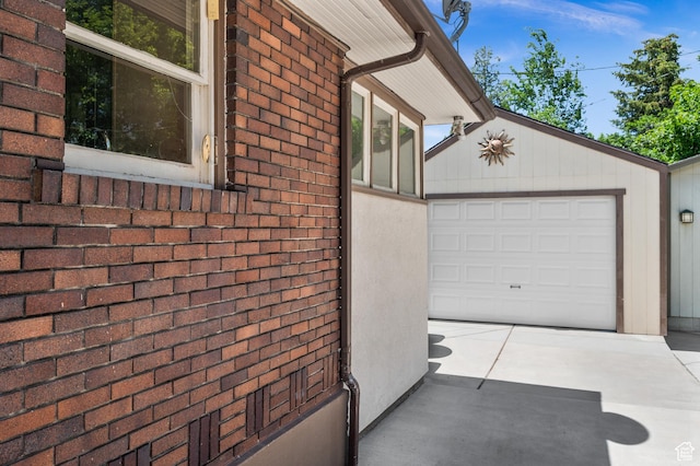 1636 S 1400 E, Salt Lake City, UT 84105 - view of home's exterior with concrete driveway and brick siding