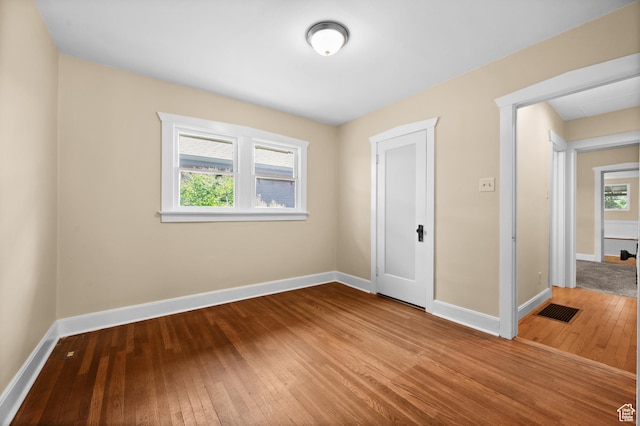 1636 S 1400 E, Salt Lake City, UT 84105 - unfurnished bedroom featuring wood-type flooring and baseboards