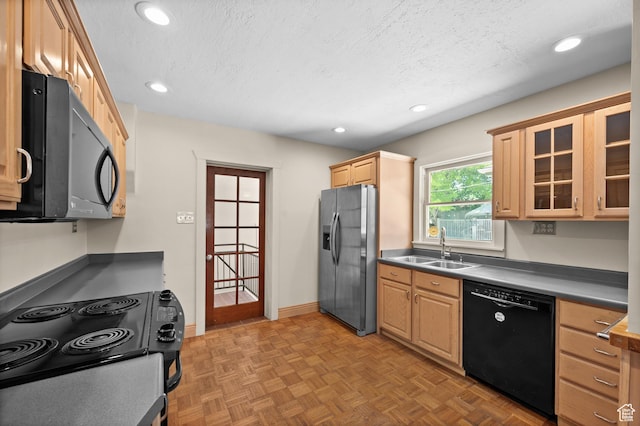 1636 S 1400 E, Salt Lake City, UT 84105 - kitchen featuring black appliances, a sink, light brown cabinets, recessed lighting, and glass insert cabinets