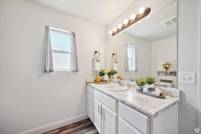 384 N 600 E, Payson, UT 84651 - bathroom featuring vanity, wood finished floors, and baseboards