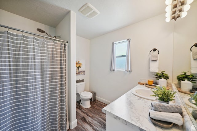 384 N 600 E, Payson, UT 84651 - full bathroom with vanity, toilet, wood finished floors, baseboards, and curtained shower