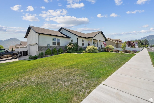384 N 600 E, Payson, UT 84651 - ranch-style house featuring stone siding, an attached garage, a front yard, and a mountain view