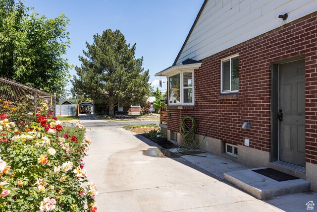 1217 Talisman Dr, Salt Lake City, UT 84116 - view of side of property featuring brick siding