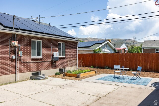 1217 Talisman Dr, Salt Lake City, UT 84116 - view of patio with a vegetable garden