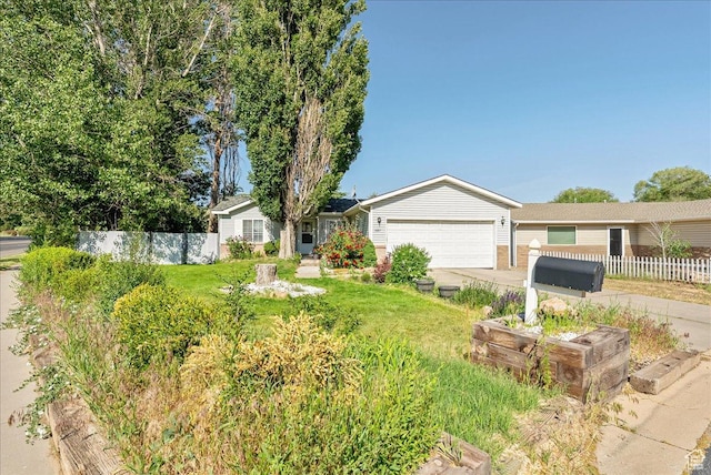 1687 Kylee Ln, Ogden, UT 84404 - single story home with concrete driveway and an attached garage