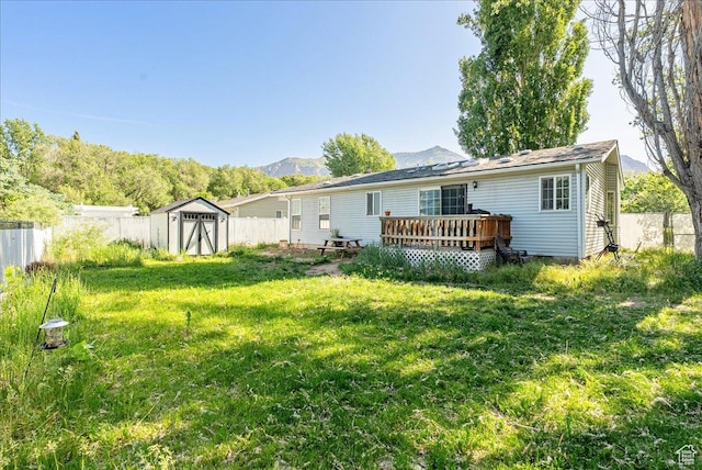 1687 Kylee Ln, Ogden, UT 84404 - rear view of property featuring a deck with mountain view