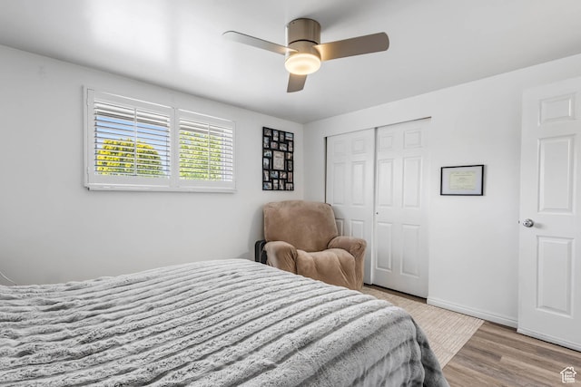8265 S 3450 W, West Jordan, UT 84088 - bedroom featuring a closet, ceiling fan, baseboards, and wood finished floors