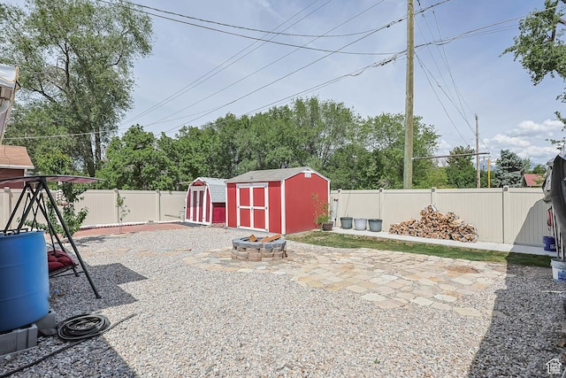 8265 S 3450 W, West Jordan, UT 84088 - fenced backyard featuring a patio and a fire pit