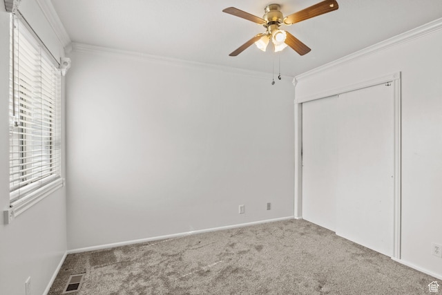 4478 S Balmoral Way, West Valley City, UT 84119 - unfurnished bedroom featuring ornamental molding, carpet floors, a closet, and baseboards