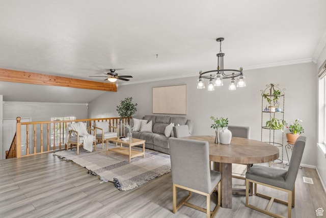 4478 S Balmoral Way, West Valley City, UT 84119 - dining area with wood finished floors, ceiling fan, a chandelier, and crown molding