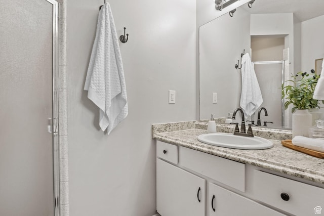 4478 S Balmoral Way, West Valley City, UT 84119 - bathroom featuring vanity and a shower stall
