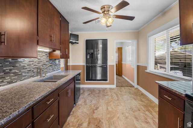 1979 S 600 E, Salt Lake City, UT 84105 - kitchen featuring a sink, black fridge, dishwashing machine, backsplash, and ceiling fan