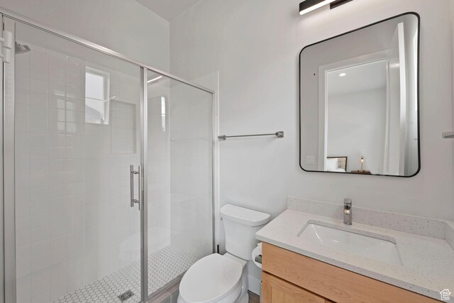 7862 S Danish Pine Ln, Salt Lake City, UT 84121 - full bathroom with vanity, toilet, and a stall shower
