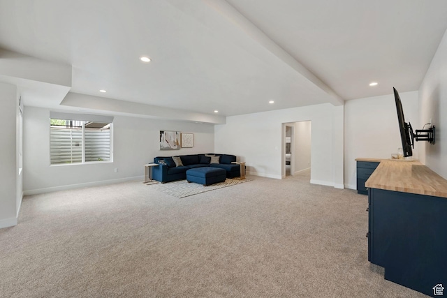 7862 S Danish Pine Ln, Salt Lake City, UT 84121 - living area featuring light carpet, baseboards, and recessed lighting