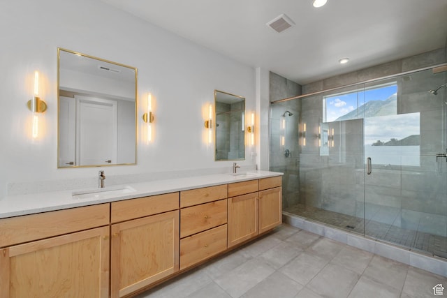 7862 S Danish Pine Ln, Salt Lake City, UT 84121 - bathroom featuring a stall shower, double vanity, tile patterned floors, and recessed lighting