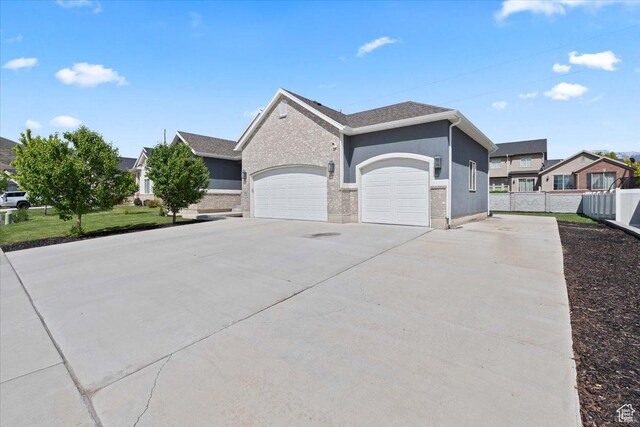 3352 N 200 W, Lehi, UT 84043 - view of front of house featuring concrete driveway and an attached garage
