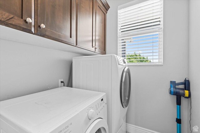3352 N 200 W, Lehi, UT 84043 - laundry area featuring separate washer and dryer, cabinet space, and baseboards