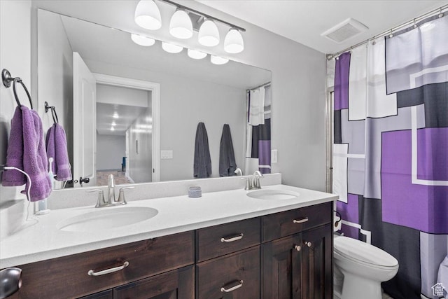 3352 N 200 W, Lehi, UT 84043 - bathroom featuring double vanity, toilet, and curtained shower