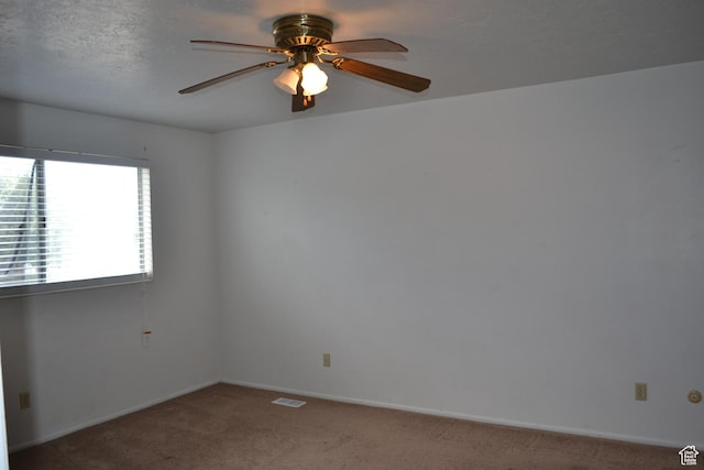 221 N Pingree Ave E, Ogden, UT 84404 - unfurnished room with carpet flooring, a ceiling fan, and baseboards