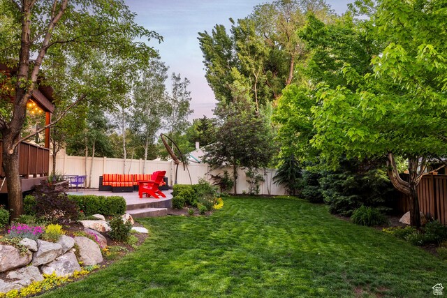 5972 S Ragsdale Dr, Murray, UT 84121 - view of yard featuring a patio and an outdoor living space