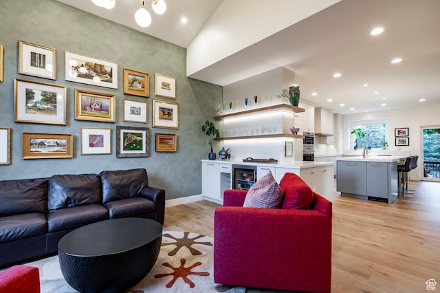 5972 S Ragsdale Dr, Murray, UT 84121 - living area featuring light wood finished floors, recessed lighting, and baseboards